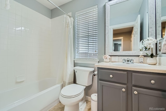 full bathroom with tile patterned floors, vanity, toilet, and shower / bath combo