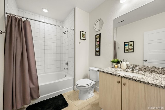 full bathroom featuring toilet, vanity, shower / bathtub combination with curtain, and tile patterned flooring