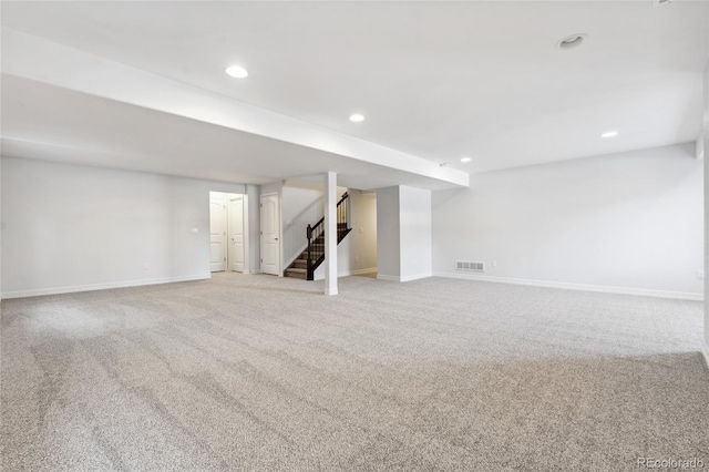 basement with light carpet