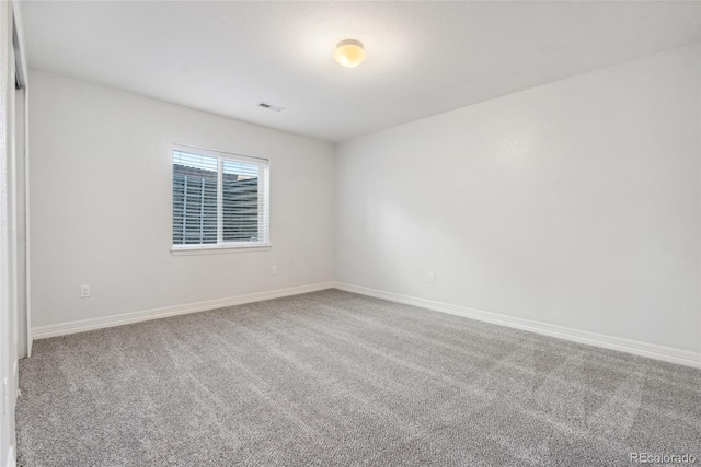 view of carpeted spare room