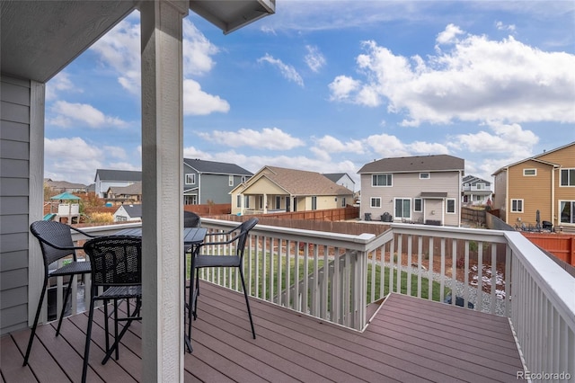 wooden deck with a yard