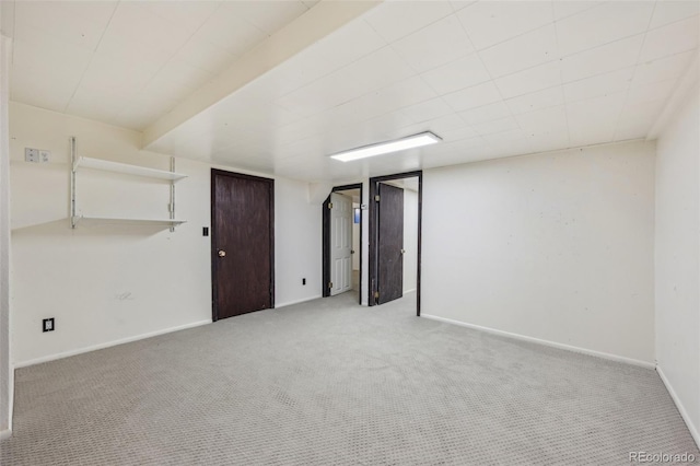 basement with carpet flooring