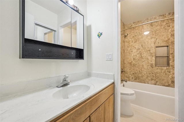 full bathroom with toilet, tiled shower / bath combo, and vanity