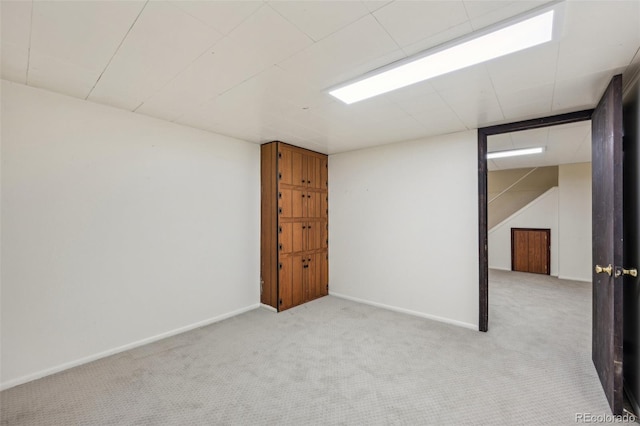 unfurnished room featuring carpet flooring