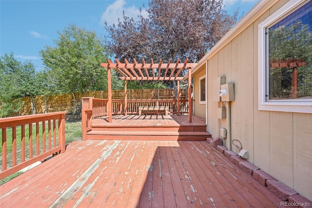 wooden terrace with a pergola