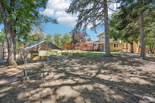 view of yard with a deck