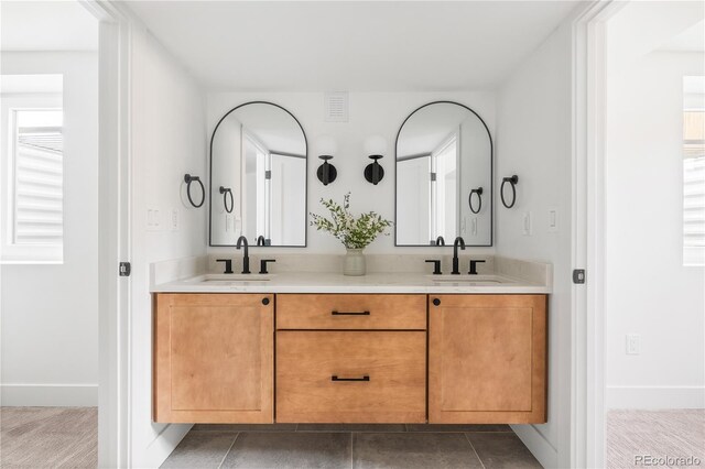 bathroom featuring vanity and tile patterned floors