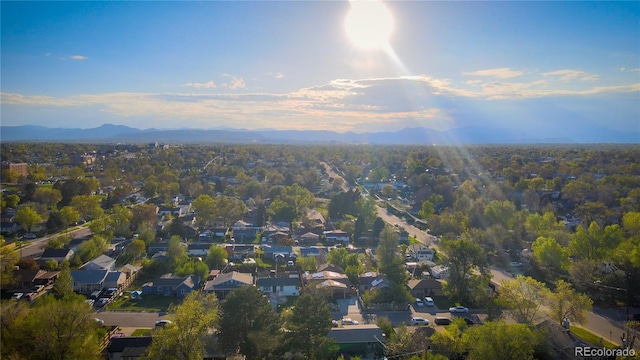 134 S Quitman St, Denver, CO 80219 - aerial view of property's location with a mountainous background
