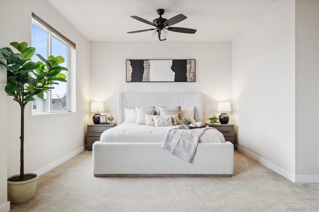 carpeted bedroom with ceiling fan