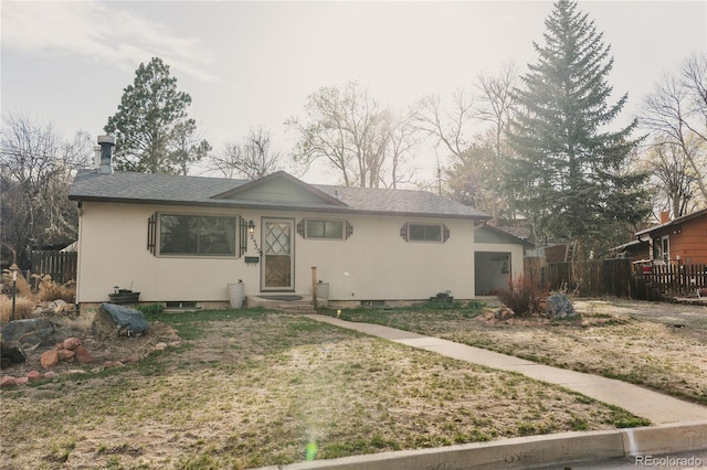 2535 W Bijou St, Colorado Springs, CO 80904 - ranch-style home with entry steps, roof with shingles, and fence