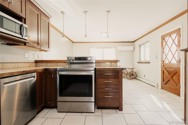 2535 W Bijou St, Colorado Springs, CO 80904 - kitchen with a peninsula, a wall mounted air conditioner, ornamental molding, a baseboard radiator, and appliances with stainless steel finishes
