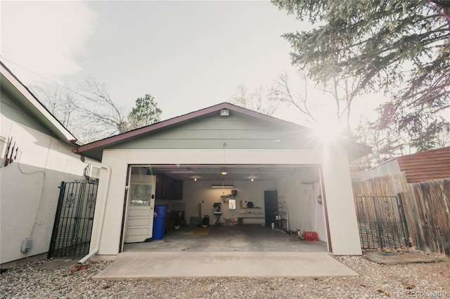 2535 W Bijou St, Colorado Springs, CO 80904 - garage featuring fence and a gate
