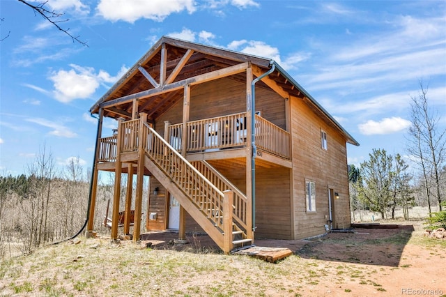631 County Road 61, Cripple Creek, CO 80813 - rear view of house featuring stairs and a deck