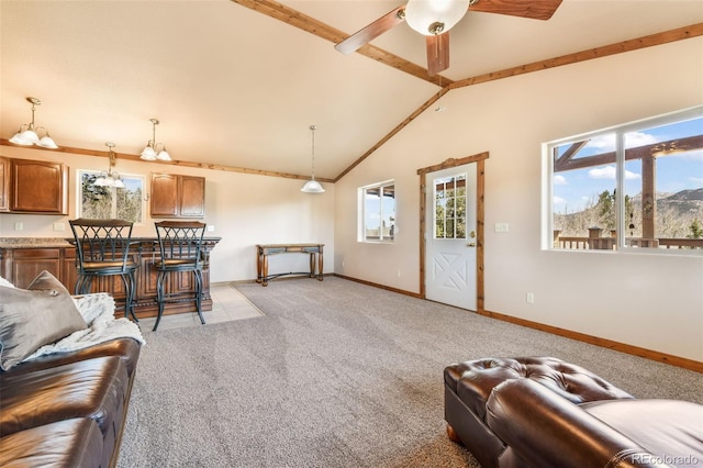 631 County Road 61, Cripple Creek, CO 80813 - living room with light carpet, plenty of natural light, baseboards, and ceiling fan