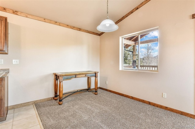 631 County Road 61, Cripple Creek, CO 80813 - unfurnished dining area with vaulted ceiling and baseboards