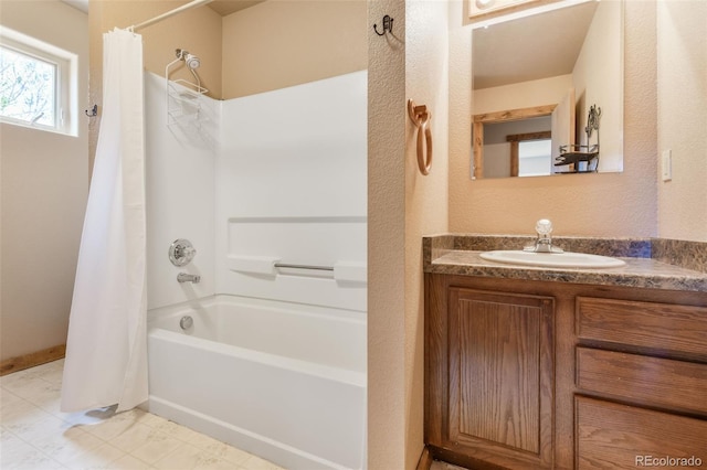 631 County Road 61, Cripple Creek, CO 80813 - full bath featuring shower / bathtub combination with curtain, vanity, and baseboards
