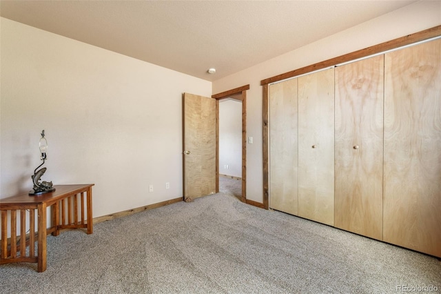 631 County Road 61, Cripple Creek, CO 80813 - unfurnished bedroom featuring carpet flooring, baseboards, and a closet