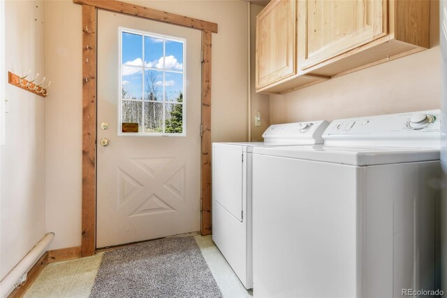 631 County Road 61, Cripple Creek, CO 80813 - laundry room featuring cabinet space and washing machine and dryer