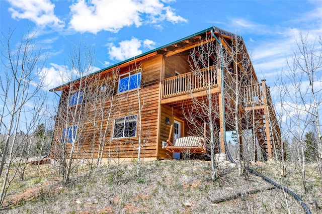 631 County Road 61, Cripple Creek, CO 80813 - rear view of property featuring a wooden deck