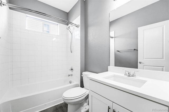 6932 E 133rd Ave, Thornton, CO 80602 - full bathroom featuring vanity, shower / bath combination, and wood finished floors