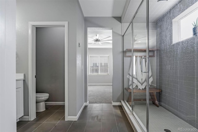 6932 E 133rd Ave, Thornton, CO 80602 - bathroom with a stall shower, tile patterned floors, vanity, and ceiling fan