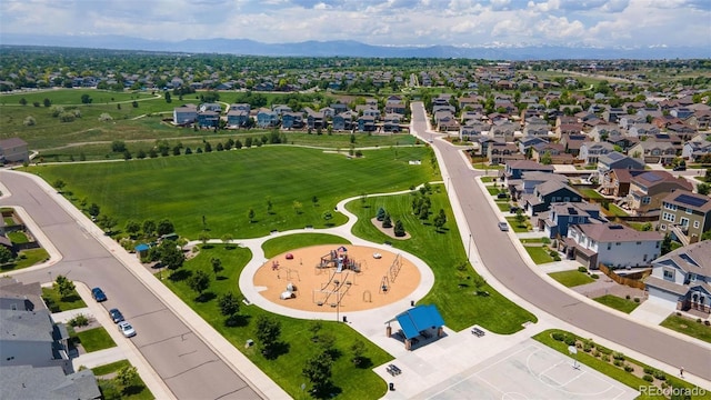 6932 E 133rd Ave, Thornton, CO 80602 - aerial perspective of suburban area featuring a mountainous background