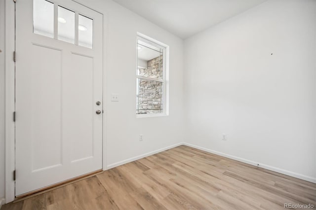 entrance foyer featuring light wood-type flooring