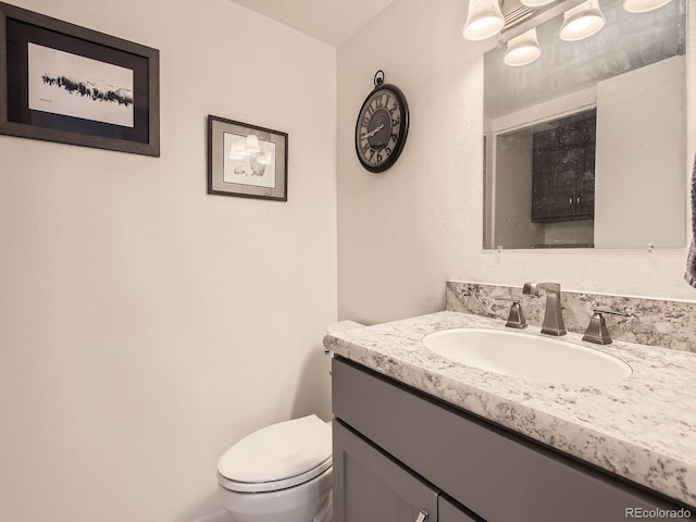 13645 E Yale Ave Unit C, Aurora, CO 80014 - bathroom with toilet and vanity