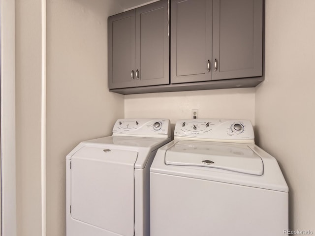 13645 E Yale Ave Unit C, Aurora, CO 80014 - laundry room with cabinet space and separate washer and dryer