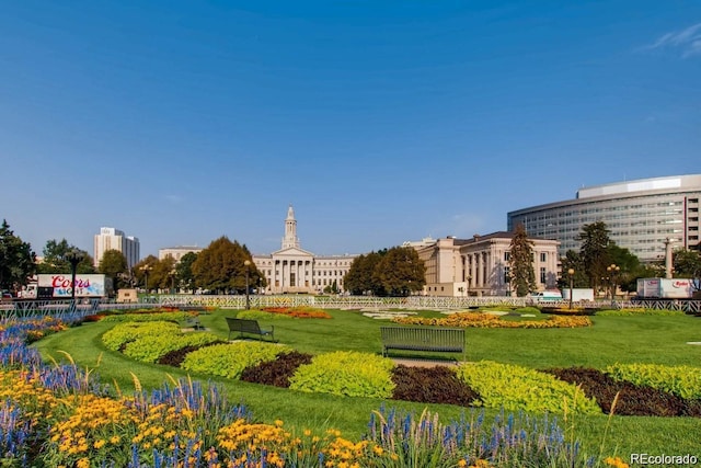 view of home's community featuring a lawn