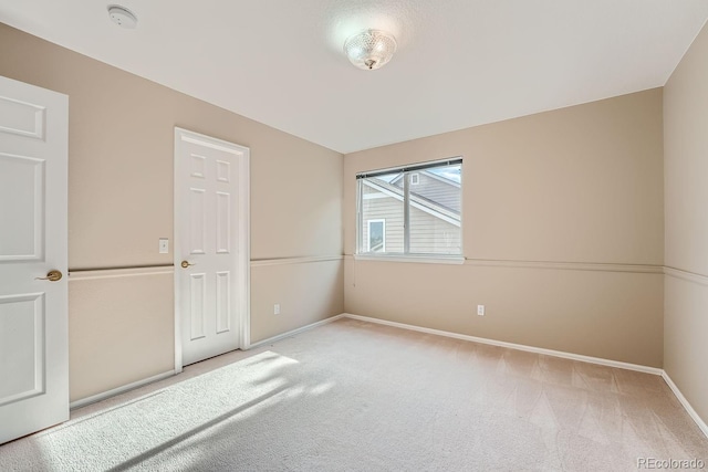 unfurnished bedroom with carpet