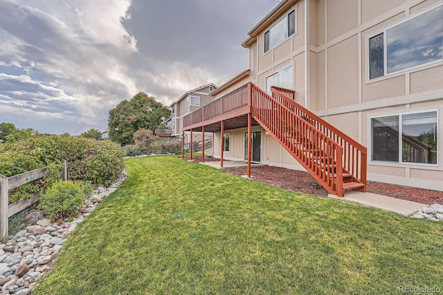 view of yard featuring a deck