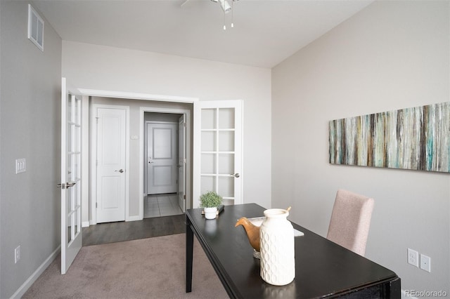 carpeted office featuring ceiling fan, french doors, and baseboards