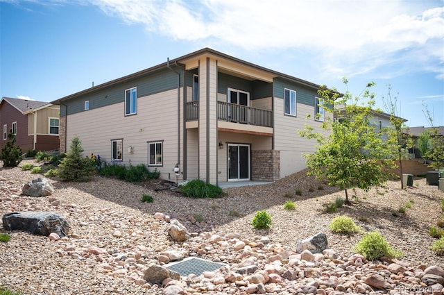 10786 Bear Cub Dr, Broomfield, CO 80021 - back of house with a balcony