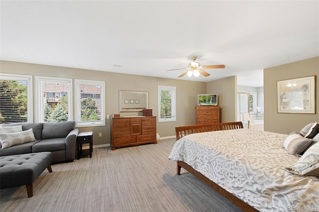 85 Willowleaf Dr, Littleton, CO 80127 - bedroom featuring light carpet, baseboards, and a ceiling fan