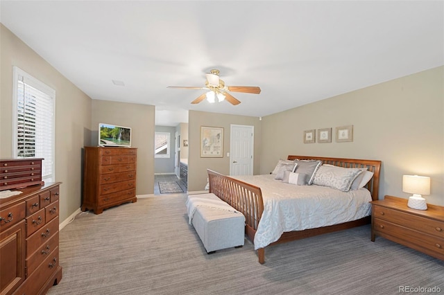 85 Willowleaf Dr, Littleton, CO 80127 - bedroom with light colored carpet, a ceiling fan, and baseboards
