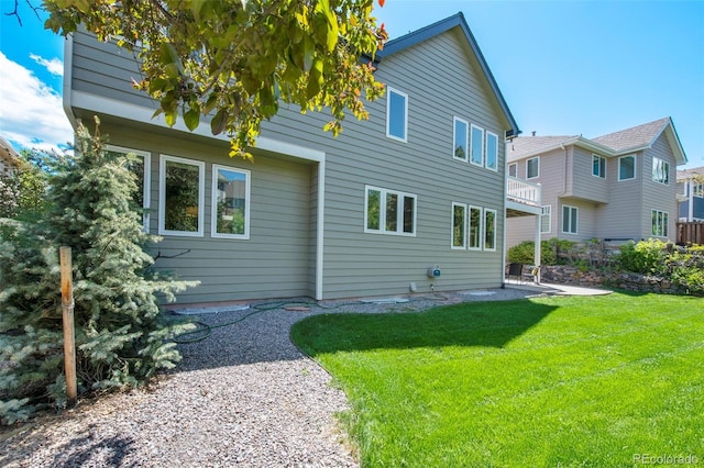 85 Willowleaf Dr, Littleton, CO 80127 - rear view of property featuring a yard and a patio