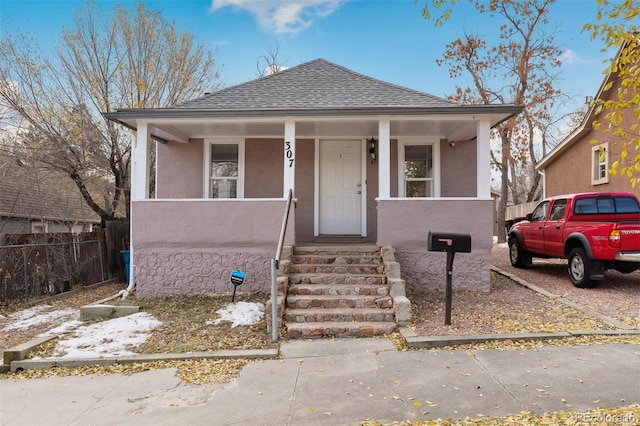 bungalow-style home with a porch