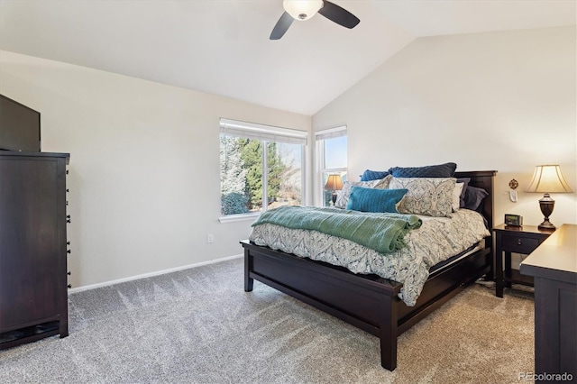 carpeted bedroom with ceiling fan and lofted ceiling