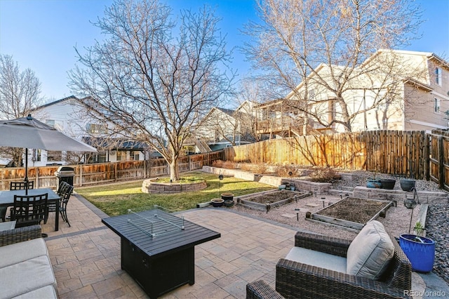 view of patio featuring a grill