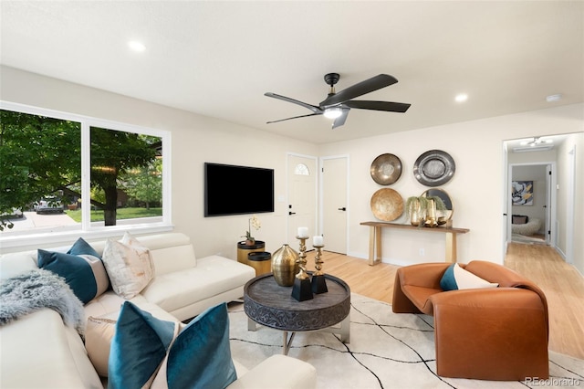 6512 Upham St, Arvada, CO 80003 - living area featuring light wood-style floors, ceiling fan, and recessed lighting