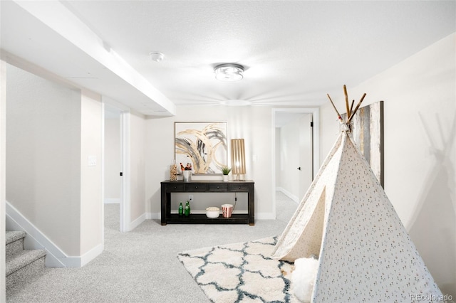 6512 Upham St, Arvada, CO 80003 - recreation room with carpet flooring and baseboards