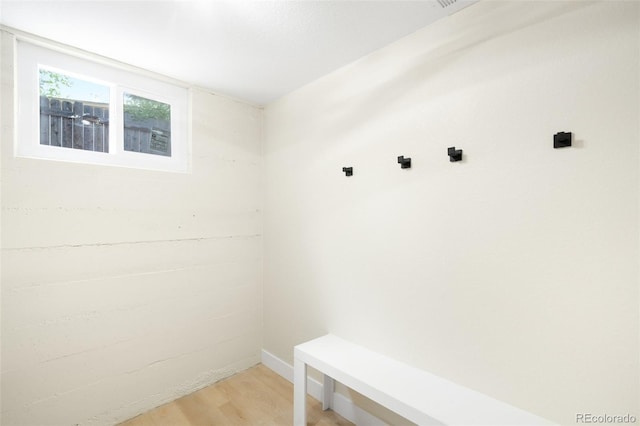 6512 Upham St, Arvada, CO 80003 - mudroom featuring light wood-type flooring and baseboards