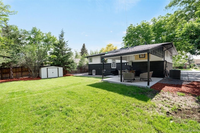 6512 Upham St, Arvada, CO 80003 - back of house with a patio area, outdoor lounge area, and central AC unit