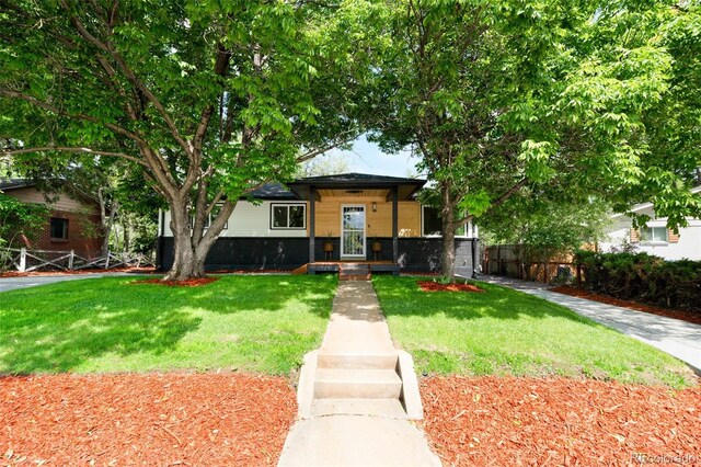6512 Upham St, Arvada, CO 80003 - bungalow-style house with brick siding