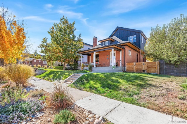 view of front of house with a front lawn