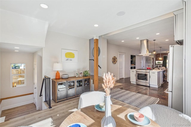 dining room with light hardwood / wood-style floors