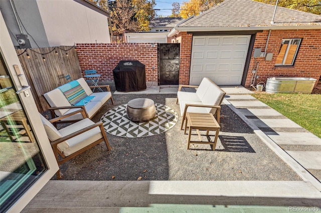 view of patio with an outdoor living space and grilling area