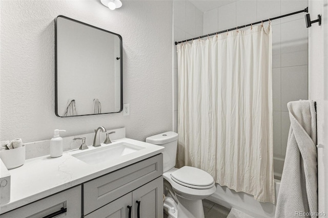 full bathroom with vanity, shower / bath combination with curtain, and toilet