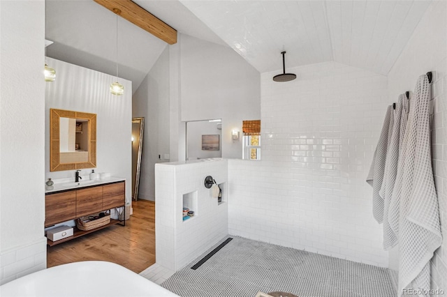 bathroom featuring vanity, wood-type flooring, lofted ceiling with beams, and walk in shower